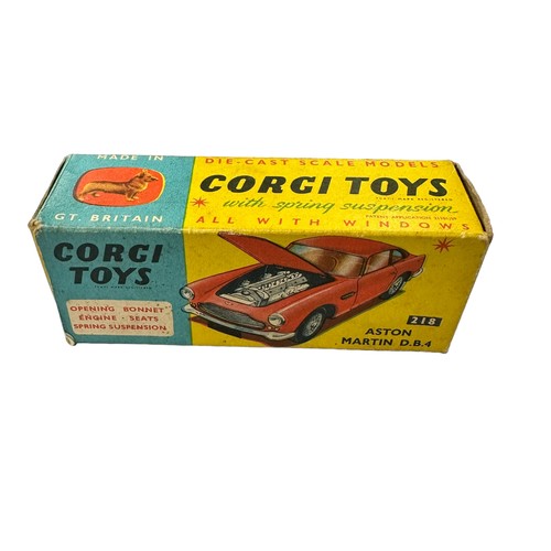 119 - Corgi Aston Martin DB4 yellow with red interior and flat hubs No. 218, generally excellent in good p... 