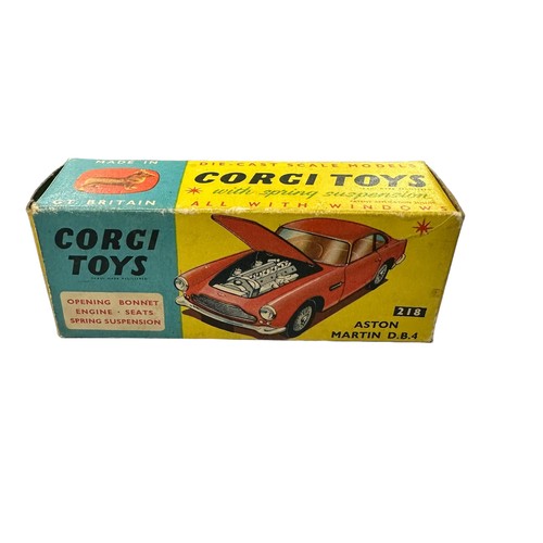 120 - Corgi Aston Martin DB4 red with lemon interior and spun hubs No. 218, generally excellent to good pl... 