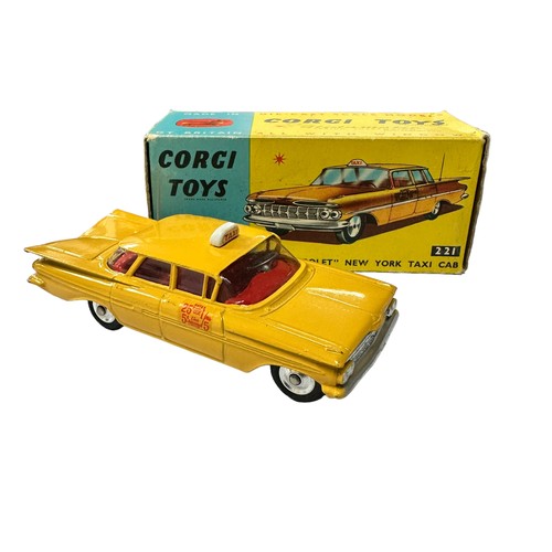 122 - Corgi Chevrolet Impala Taxi yellow with intact and straight aerial No. 221, generally excellent in  ... 