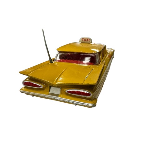 122 - Corgi Chevrolet Impala Taxi yellow with intact and straight aerial No. 221, generally excellent in  ... 