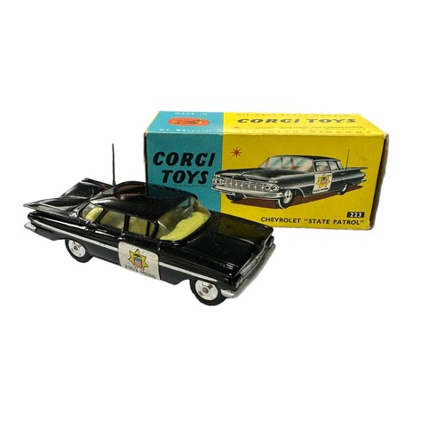 124 - Corgi Chevrolet State Patrol with intact and straight aerial No. 223, generally excellent in good pl... 