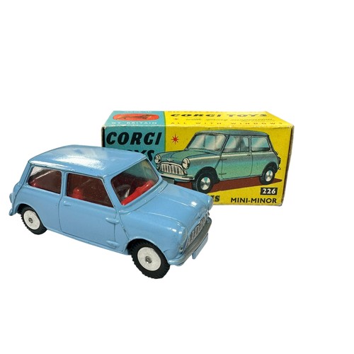 128 - Corgi Morris Mini-Minor blue with red interior and flat hubs No. 226, generally excellent in excelle... 