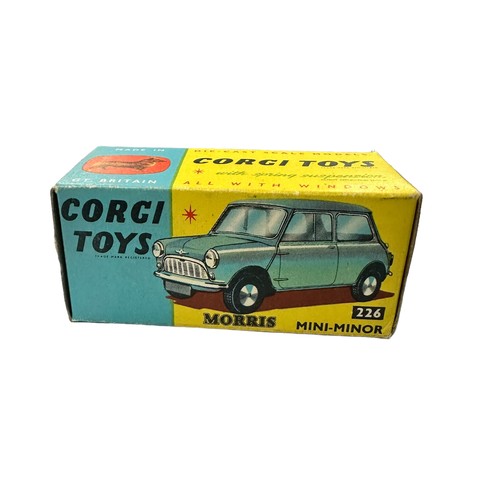 128 - Corgi Morris Mini-Minor blue with red interior and flat hubs No. 226, generally excellent in excelle... 