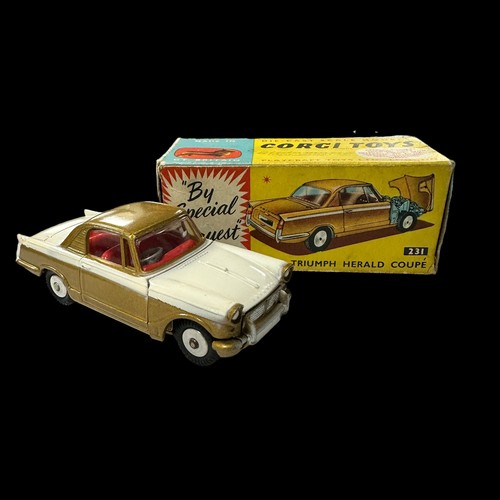 132 - Corgi Triumph Herald Coupe metallic gold and white with red interior No. 231, generally excellent in... 