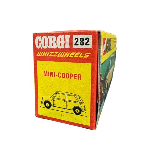 271 - Corgi Whizzwheels Mini-Cooper No. 282, generally excellent to good plus in (paper decals fading) exc... 