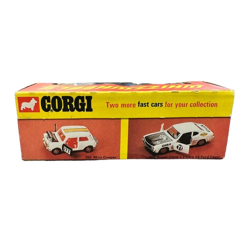 298 - Corgi Whizzwheels Datsun 240Z pair, generally excellent in excellent window boxes (price pencil mark... 