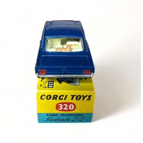 186 - Corgi Ford Mustang Fastback 2+2 No. 320, generally excellent in excellent to good plus blue and yell... 