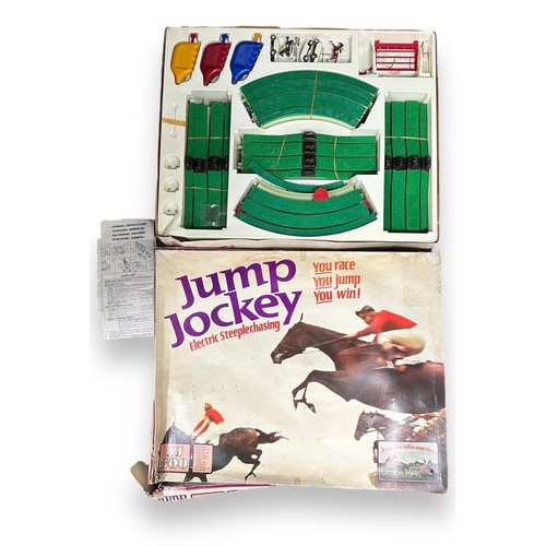 39 - Triang Jump Jockey electric steeplechase slot-racing set Nos. JJ100 & JJ300, generally good plus in ... 