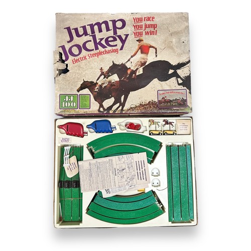 39 - Triang Jump Jockey electric steeplechase slot-racing set Nos. JJ100 & JJ300, generally good plus in ... 