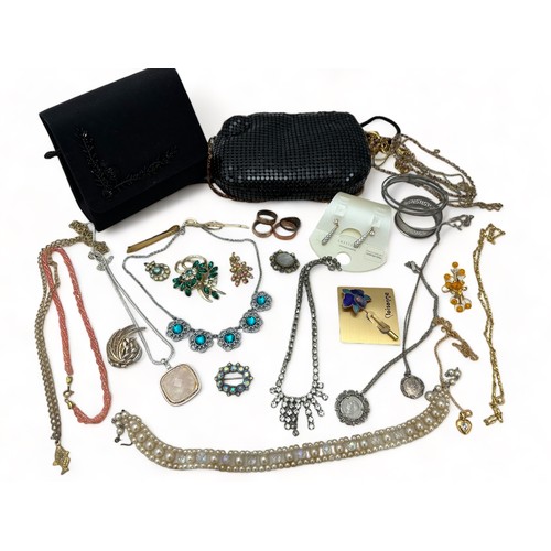 61 - An assortment of silver and costume jewellery, plus two ladies bags, a silver napkin holder etc.

Pl... 