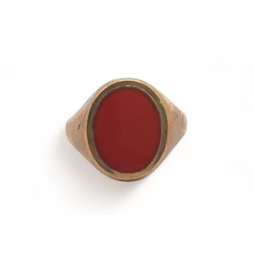 11 - A 9ct gold Carnelian signet ring, size R. Marks for London 1965.  Carnelian approx 15mm x 11mm. Weig... 