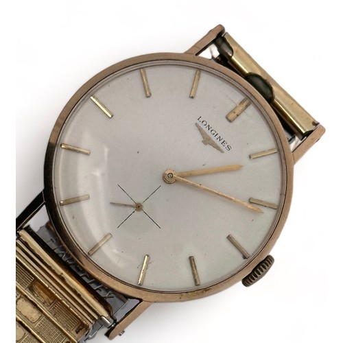 68 - Longines gents 9ct gold watch. Silvered dial with baton hour markers and sub seconds dial.  Inscribe... 