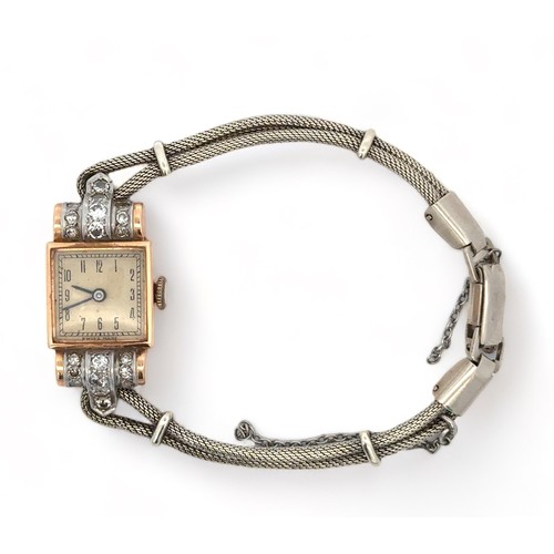 70 - A ladies 18ct gold and diamond cocktail watch, hallmarks to inner case, on an unmarked metal bracele... 