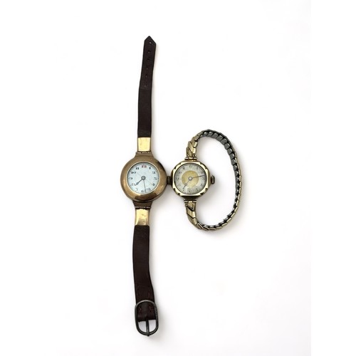 71 - Two vintage watches. A half hunter style watch in yellow metal case and brown leather strap, 24g. An... 