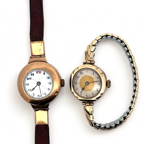 71 - Two vintage watches. A half hunter style watch in yellow metal case and brown leather strap, 24g. An... 