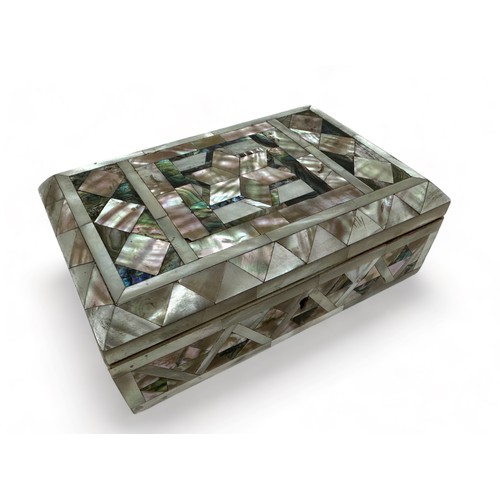 66 - An inlaid mother of pearl hinged jewellery / trinket box on four feet, possibly Victorian. Dimension... 