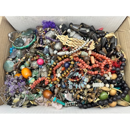 60 - A box of hardstone and costume jewellery.

Please see the buyer's terms and conditions for purchasin... 