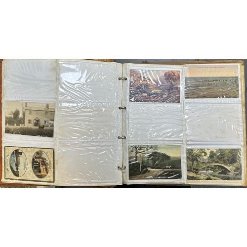 409 - An early to mid 20th Century range of postcards (198) in an an album, in mixed condition, with stree... 