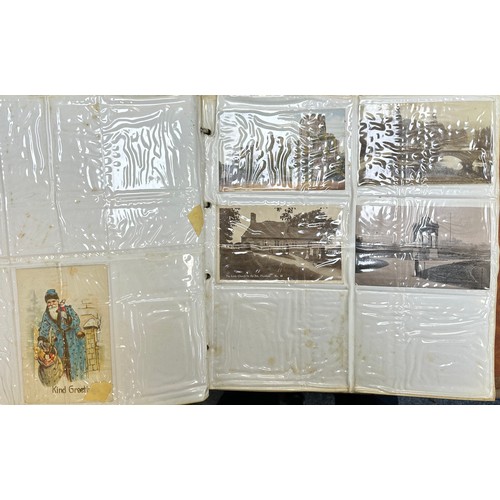 409 - An early to mid 20th Century range of postcards (198) in an an album, in mixed condition, with stree... 