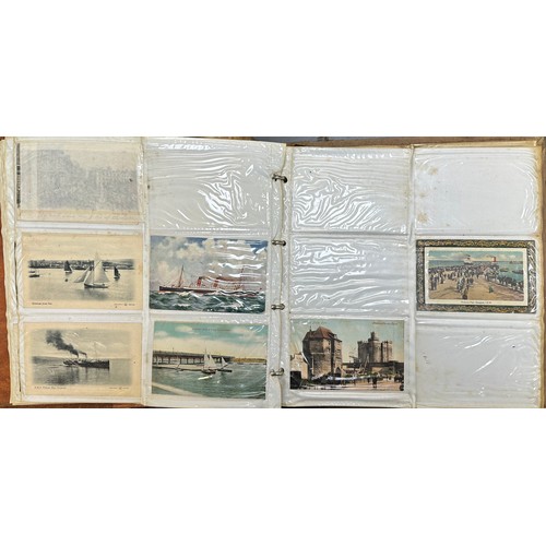 409 - An early to mid 20th Century range of postcards (198) in an an album, in mixed condition, with stree... 