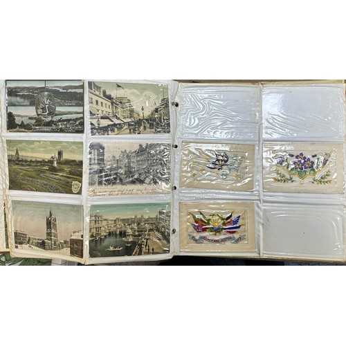 409 - An early to mid 20th Century range of postcards (198) in an an album, in mixed condition, with stree... 