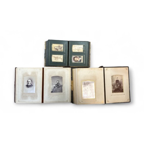 411 - A collection of Victorian photographic cabinet cards / Cartes de Visite, with 151 cards in 3 contemp... 