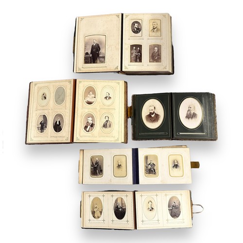 411 - A collection of Victorian photographic cabinet cards / Cartes de Visite, with 151 cards in 3 contemp... 