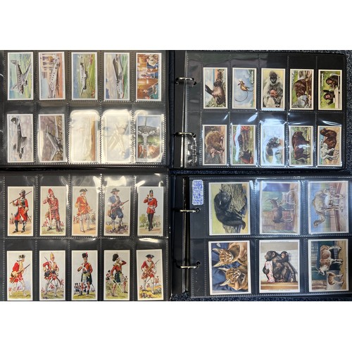 269 - Collection of cigarette cards, mainly complete sets in plastic sleeves, in 8 albums with cover sleev... 