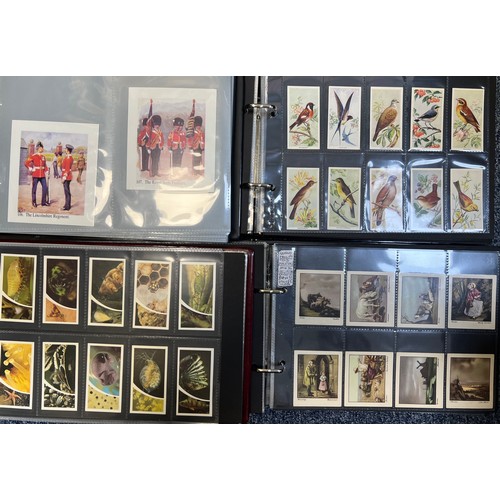 269 - Collection of cigarette cards, mainly complete sets in plastic sleeves, in 8 albums with cover sleev... 