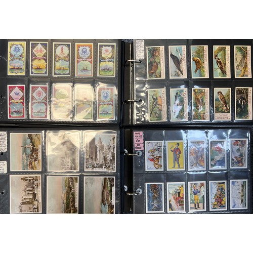 283 - Collection of cigarette cards and trade cards, mainly complete sets in plastic sleeves, in 10 albums... 