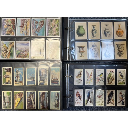 262 - Collection of cigarette cards and trade cards, mainly complete sets in plastic sleeves, in 11 albums... 