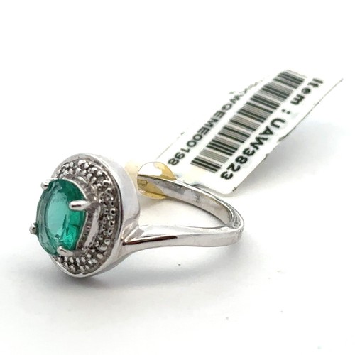 60 - A Siberian emerald and diamond white 9ct gold ring with attached tag and Certifcate of Authenticity.... 