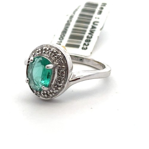 60 - A Siberian emerald and diamond white 9ct gold ring with attached tag and Certifcate of Authenticity.... 