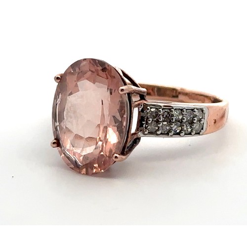 43 - A morganite and diamond ring seet in 9ct rose gold. Size S. Weight 3.55g. Tag present but has become... 