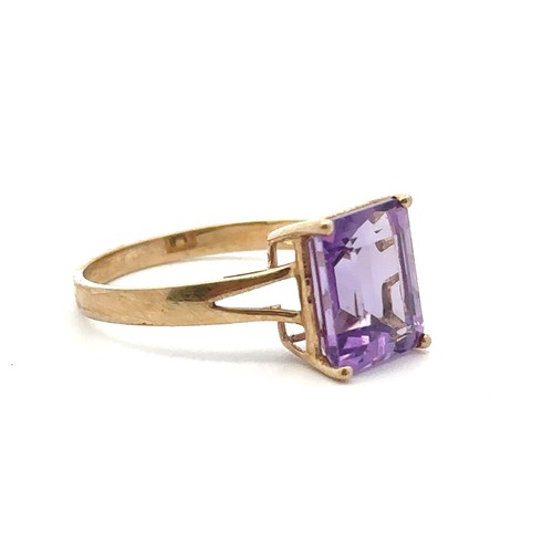 4 - A hallmarked 9ct gold and amethyst ring.  Size P. Rectangular step cut amethyst 10mm x 8mm.

Please ... 