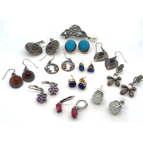 38 - Eleven pairs of gem set earrings, including ruby, amethyst, moonstone, amber etc, all stamped as 925... 