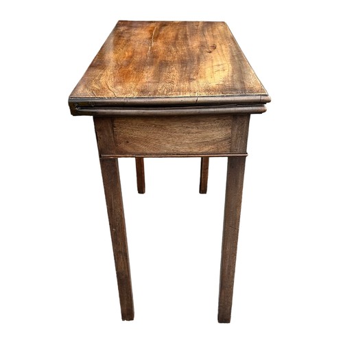 478 - An 18th Century mahogany tea table with a single draw to the the end. Fold out panel is cracked. W77... 