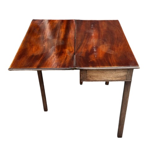 478 - An 18th Century mahogany tea table with a single draw to the the end. Fold out panel is cracked. W77... 