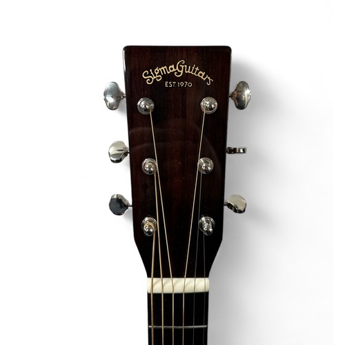 201 - Sigma SDM-18 Acoustic Guitar - Mahogany neck, back and sides with a natural spruce top. In excellent... 