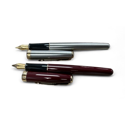 170 - Parker, two cased Parker Sonnet pens with; Parker Sonnet fountain pen dark red lacquer body and gold... 