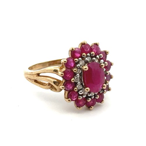 12 - A ruby and diamond 9ct gold cluster ring, size J. Weight 3.74g.

Please see the buyer's terms and co... 