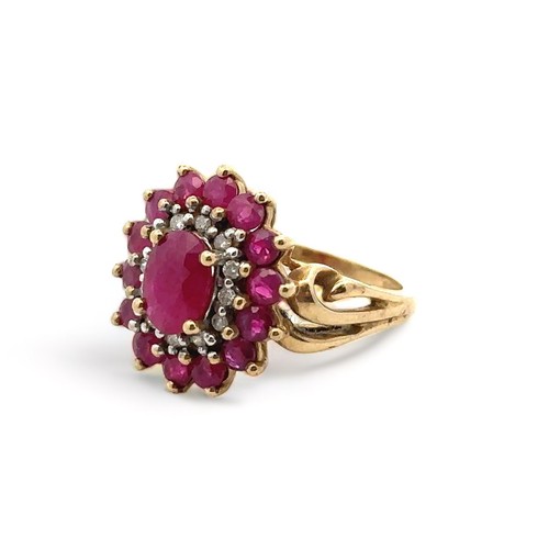 12 - A ruby and diamond 9ct gold cluster ring, size J. Weight 3.74g.

Please see the buyer's terms and co... 