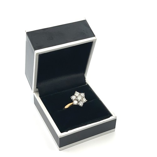 29 - An 18ct gold and diamond flower ring. Size O. Weight 4.71g. Estimated diamond weight 1.15ct. 

Pleas... 