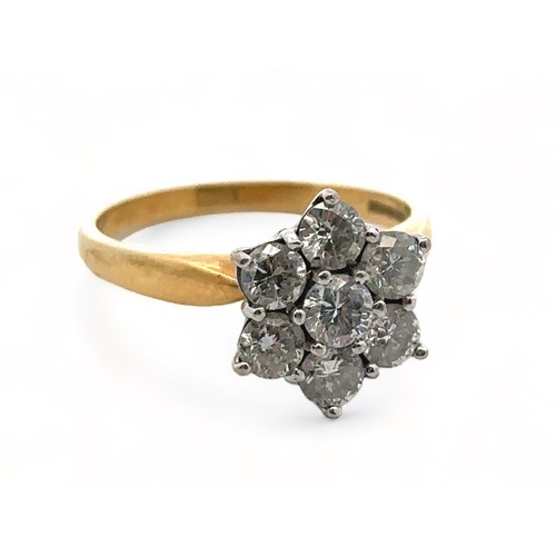 29 - An 18ct gold and diamond flower ring. Size O. Weight 4.71g. Estimated diamond weight 1.15ct. 

Pleas... 