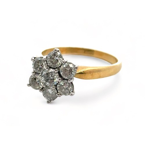 29 - An 18ct gold and diamond flower ring. Size O. Weight 4.71g. Estimated diamond weight 1.15ct. 

Pleas... 