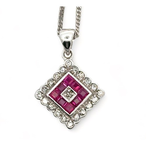 20 - A ruby and diamond 18ct white gold pendant necklace. Hallmarks to pendant and 18