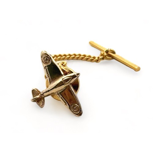 8 - A 9ct gold tie pin in the form of a Spitfire. Hallmarks to post.

Please see the buyer's terms and c... 