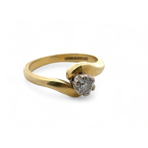 65 - An 18ct gold and approx 0.25ct diamond ring in a crossover setting. Size K.

Please see the buyer's ... 