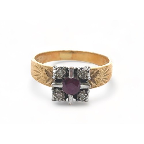 25 - A ruby and diamond gold ring stamped 18ct, size N, weight 3.8g.


Please see the buyer's terms and c... 