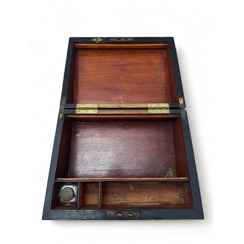 287 - A wooden writing box inlaid with various woods, containing glass inkwell. Length 29.8cm